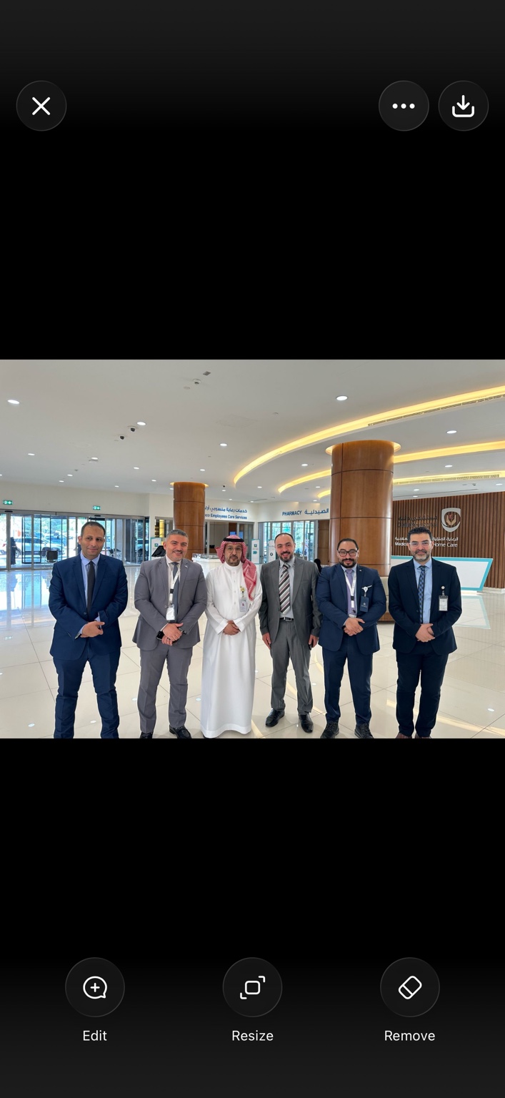 Dr. Mohamed Salama with hospital leaders at Dallah Hospital