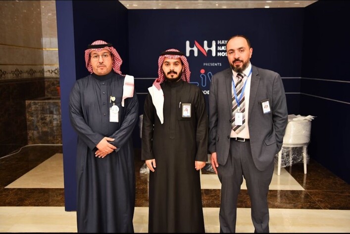 Dr. Mohamed Salama with healthcare leaders at a Hayat National Hospitals professional event