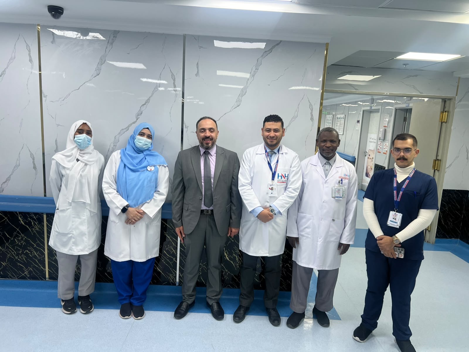 Dr. Mohamed Salama with infection prevention colleagues at the hospital
