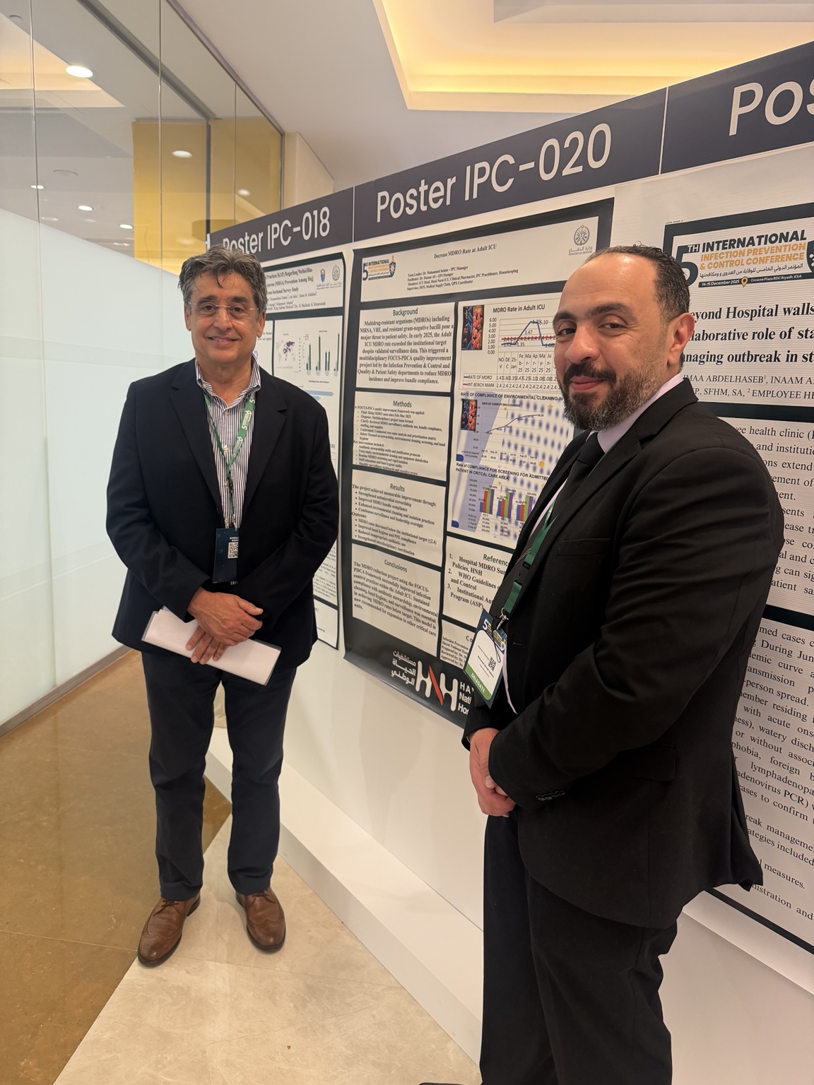 Dr. Mohamed Salama beside the MDRO improvement poster at the 5th International IPC Conference