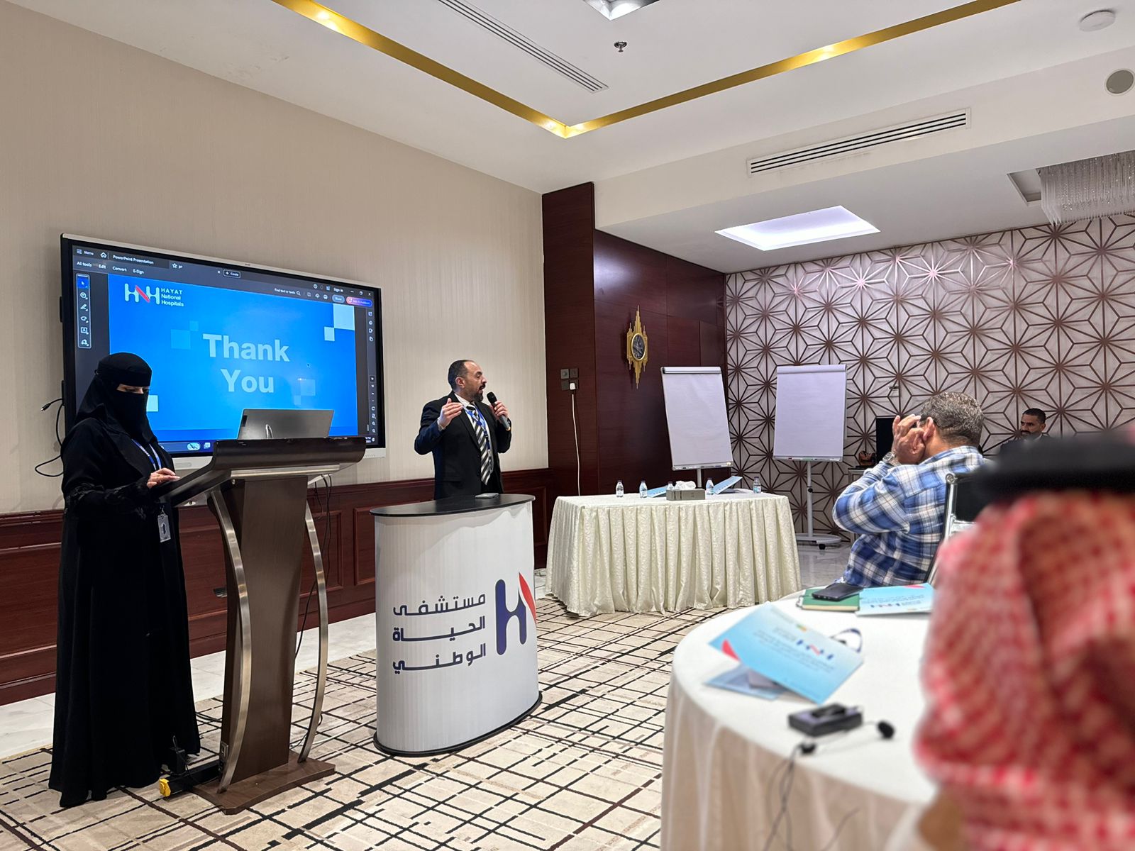 Dr. Mohamed Salama speaking during a professional healthcare program